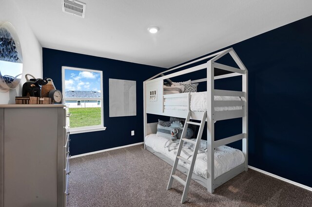 bedroom featuring carpet