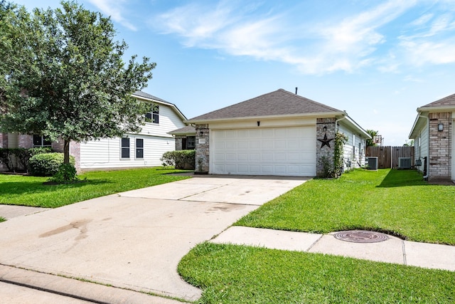 view of front of property with a garage, concrete driveway, a front yard, and cooling unit