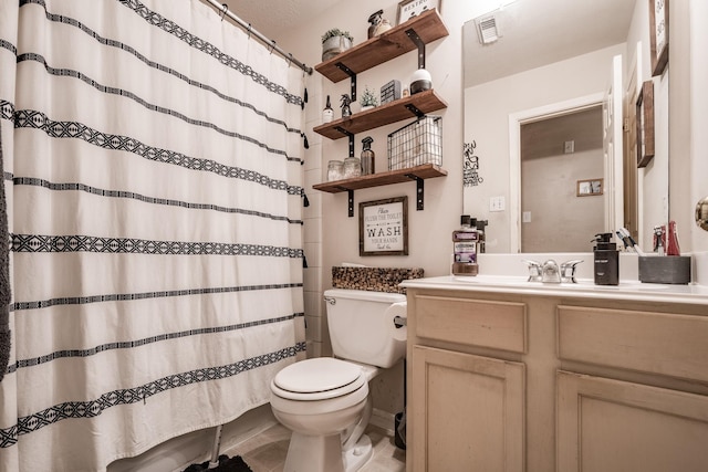 bathroom with toilet, curtained shower, vanity, and visible vents