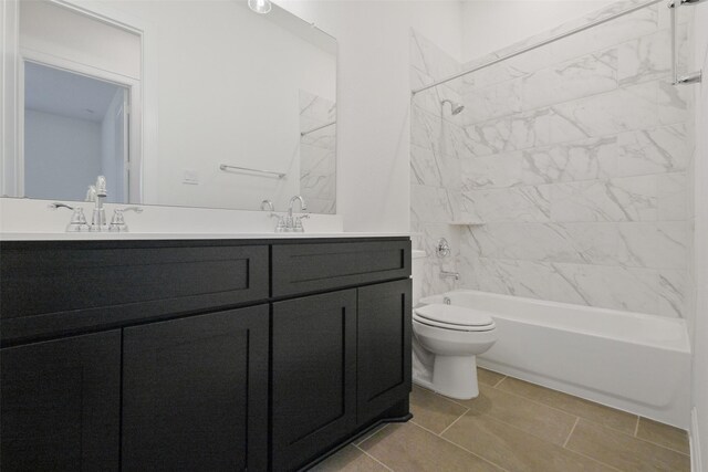 16006 Ruby Laurel Ct, Conroe, TX 77302 - bathroom with double vanity, bathtub / shower combination, and toilet