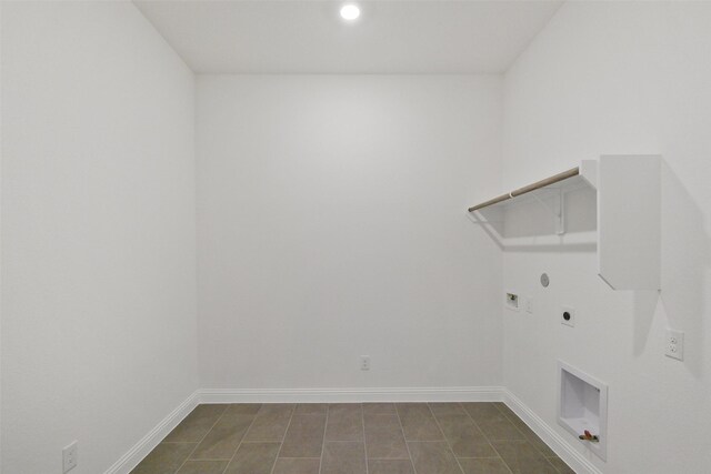 16006 Ruby Laurel Ct, Conroe, TX 77302 - laundry area featuring hookup for a gas dryer, electric dryer hookup, washer hookup, baseboards, and recessed lighting