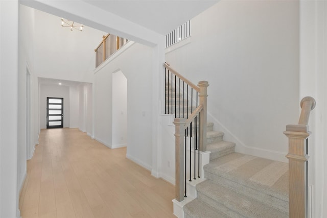 16006 Ruby Laurel Ct, Conroe, TX 77302 - stairs with wood finished floors and baseboards