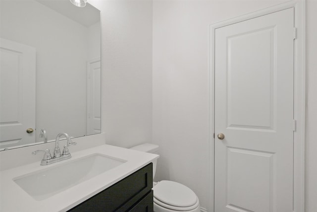 16006 Ruby Laurel Ct, Conroe, TX 77302 - half bathroom featuring vanity and toilet