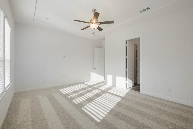 16006 Ruby Laurel Ct, Conroe, TX 77302 - spare room with light colored carpet, healthy amount of natural light, and baseboards