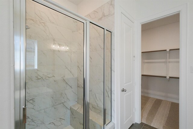 16006 Ruby Laurel Ct, Conroe, TX 77302 - full bath featuring a marble finish shower and a spacious closet
