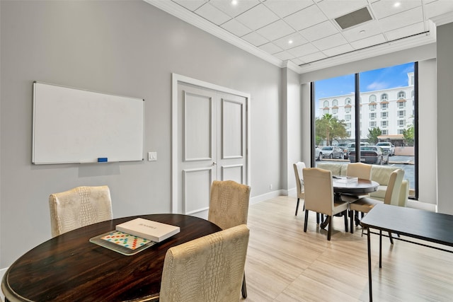 dining room featuring ornamental molding