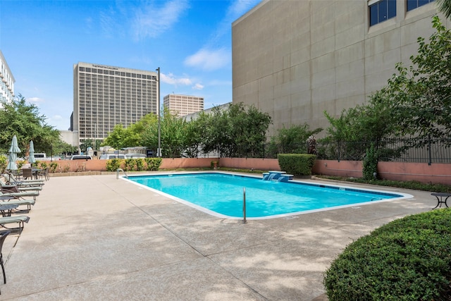 view of swimming pool featuring a patio