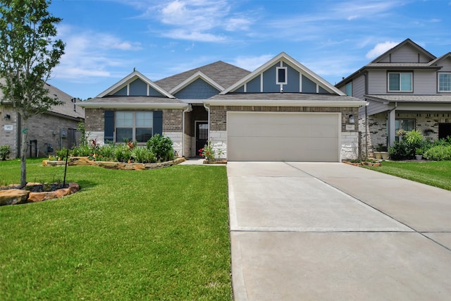 view of front of house with a garage and a front yard