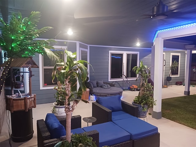 view of patio / terrace featuring an outdoor living space and ceiling fan