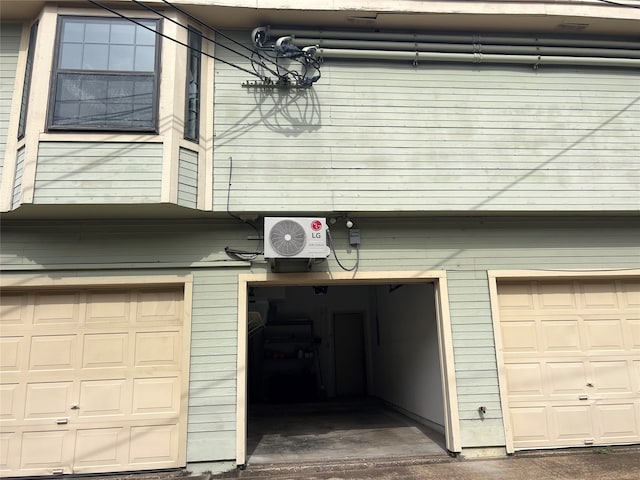 garage featuring ac unit