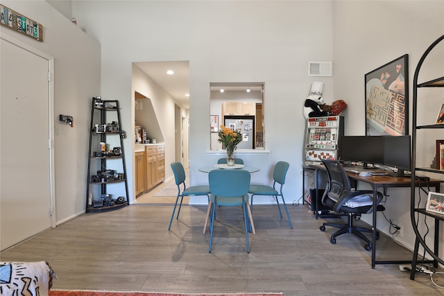 dining room featuring light hardwood / wood-style floors