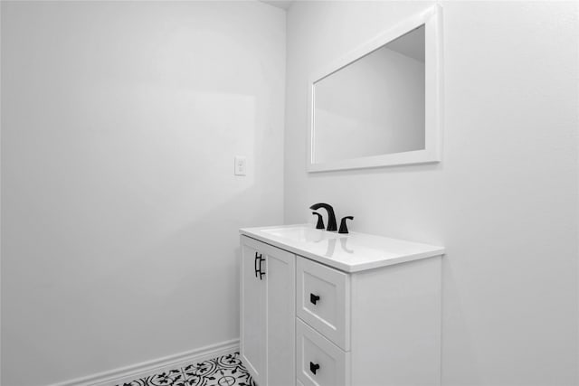 bathroom with vanity and tile patterned flooring