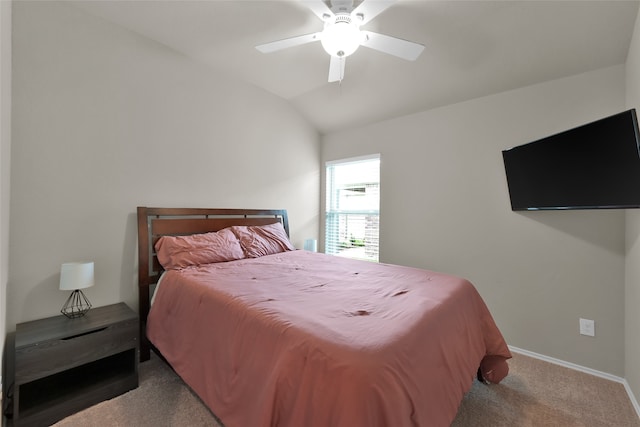 bedroom with vaulted ceiling, carpet floors, and ceiling fan