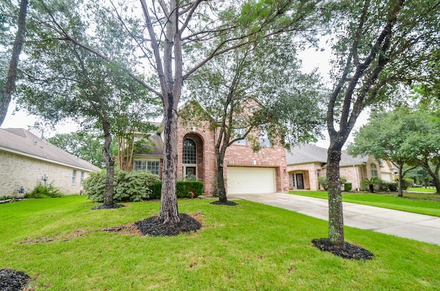 view of front facade featuring a garage and a front lawn