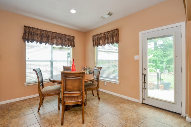 dining room featuring plenty of natural light