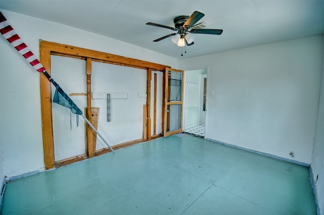 spare room featuring ceiling fan