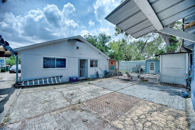 back of house featuring a patio area