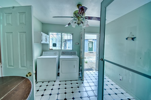 laundry area featuring cabinets, washing machine and dryer, light tile patterned floors, and ceiling fan