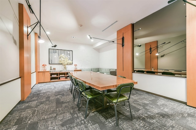 view of carpeted dining space