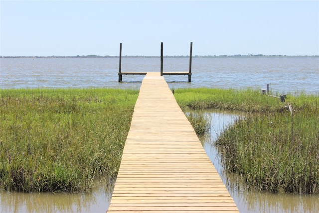 dock area featuring a water view