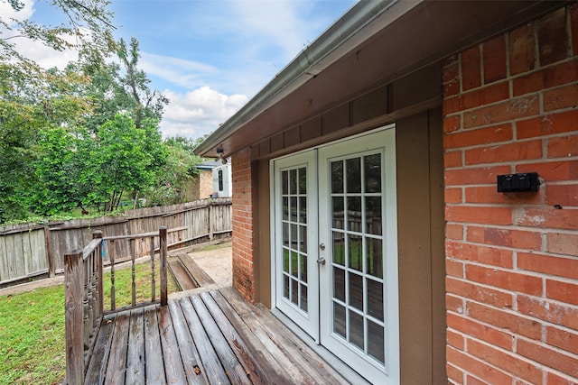 wooden terrace featuring french doors