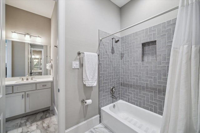 bathroom with vanity and shower / bath combo with shower curtain