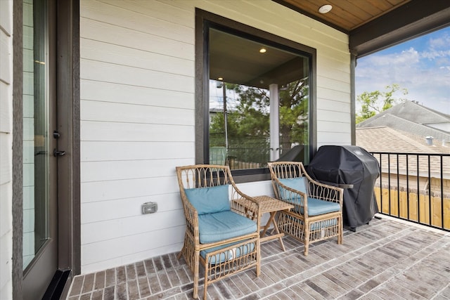 balcony featuring area for grilling