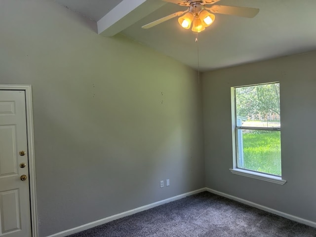 carpeted spare room featuring beamed ceiling and ceiling fan