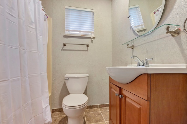 bathroom with tile patterned flooring, vanity, toilet, and a shower with shower curtain