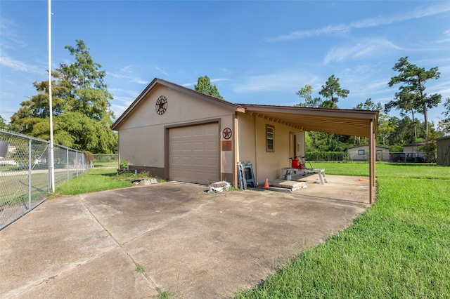 exterior space with a lawn and a carport