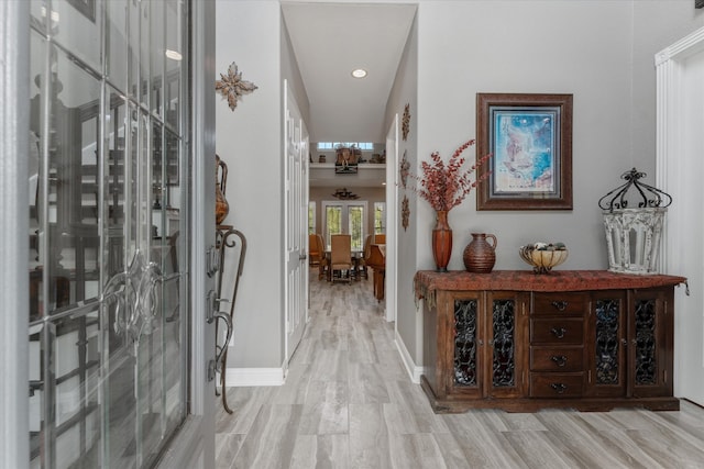 hallway featuring light hardwood / wood-style flooring