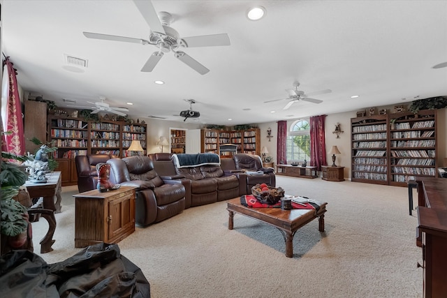 living room featuring ceiling fan and light carpet