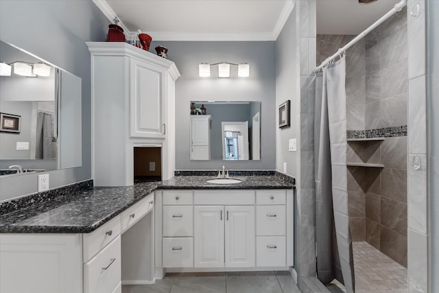 bathroom featuring a shower with curtain, crown molding, and vanity