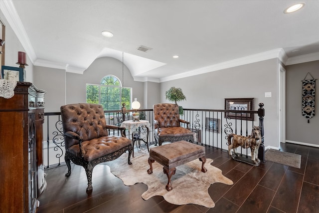 living area featuring ornamental molding and wood-type flooring