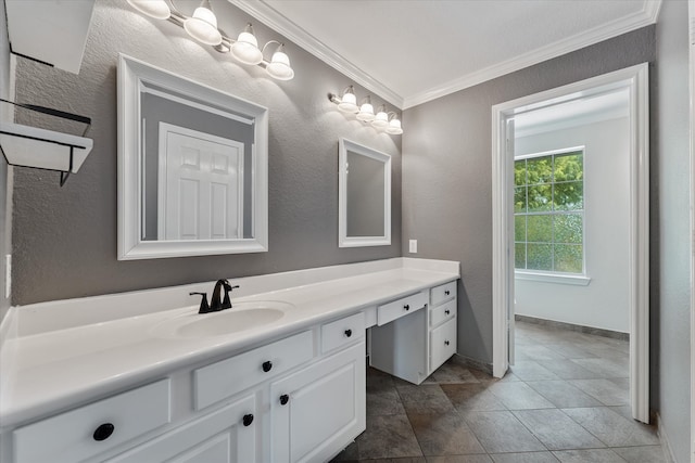 bathroom with tile patterned floors, vanity, and ornamental molding