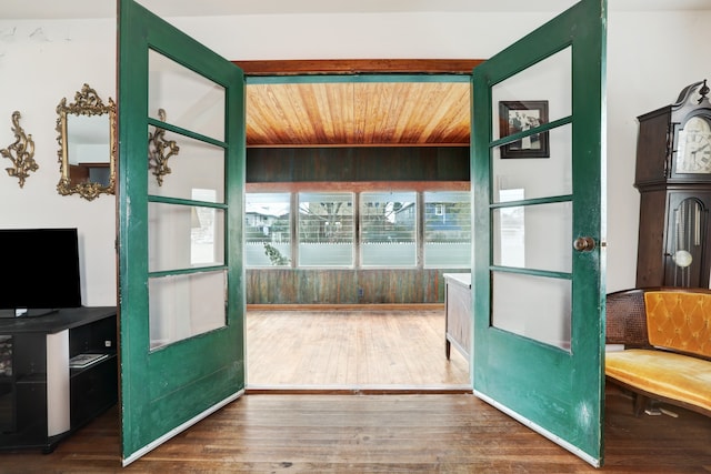 doorway to outside featuring wood ceiling and hardwood / wood-style flooring