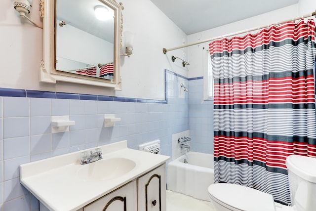 full bathroom featuring vanity, toilet, shower / bath combo, and backsplash