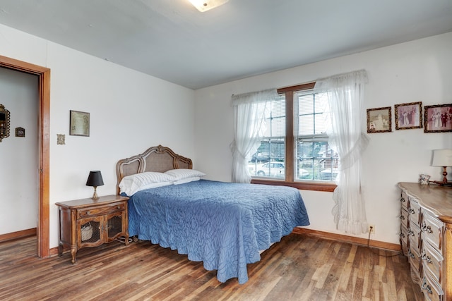 bedroom featuring wood-type flooring