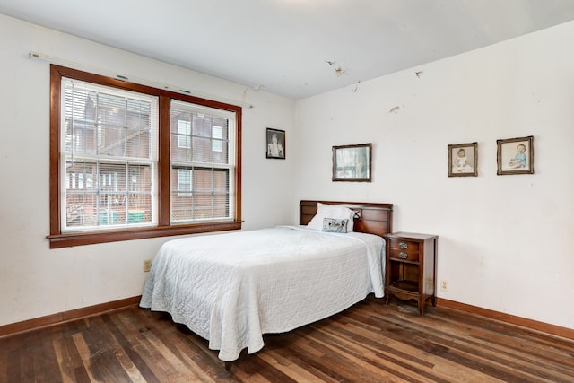 bedroom featuring dark hardwood / wood-style floors