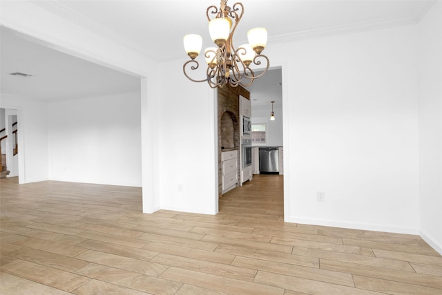 unfurnished dining area with ornamental molding, stairway, visible vents, and light wood-style flooring