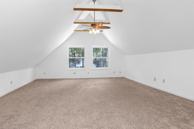 bonus room featuring ceiling fan, baseboards, vaulted ceiling, and carpet flooring