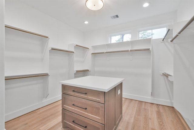 spacious closet with light wood-type flooring