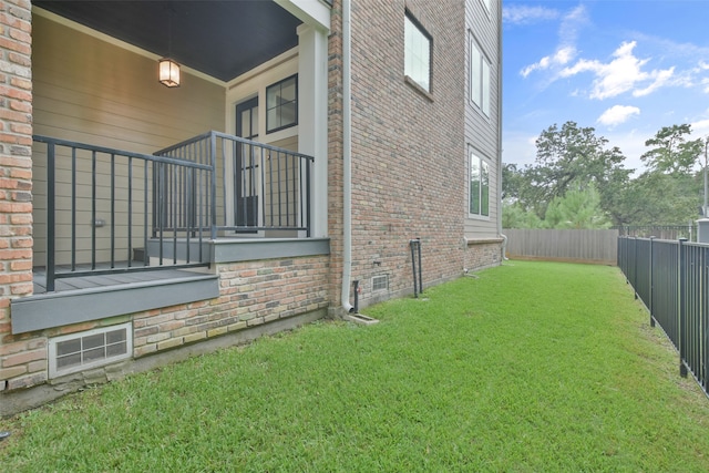 view of property exterior with a yard