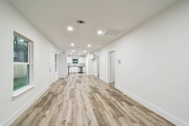 hallway featuring light wood-type flooring