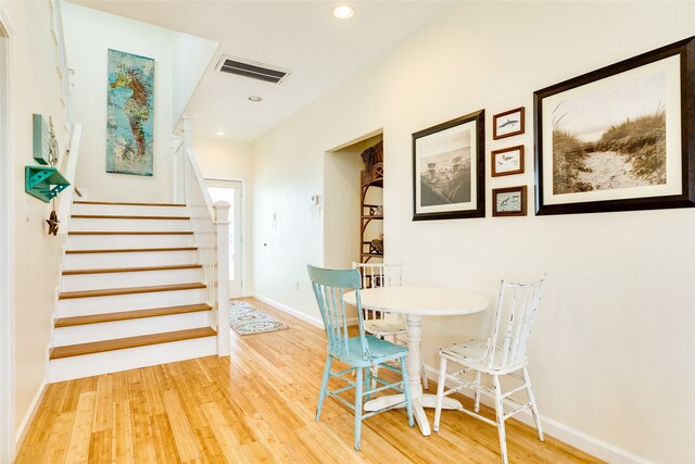 dining space featuring hardwood / wood-style flooring