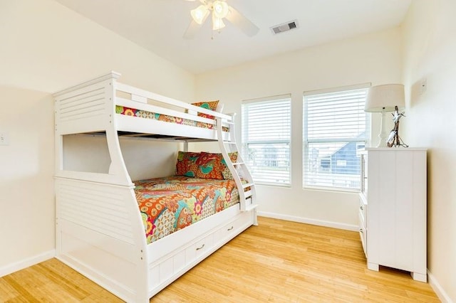 bedroom featuring ceiling fan and light hardwood / wood-style floors