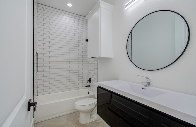 full bathroom with vanity, tile patterned flooring, tiled shower / bath combo, and toilet