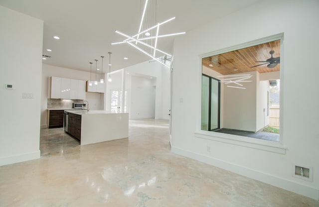 unfurnished dining area featuring wood ceiling and ceiling fan with notable chandelier