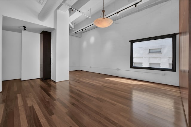 interior space with dark hardwood / wood-style floors