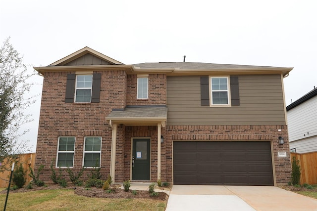 view of front of property featuring a garage